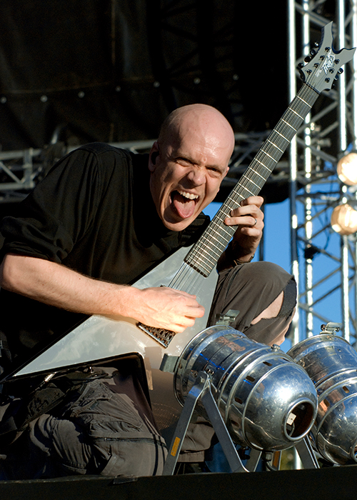 musican Devin Townsend showing his tongue on stage